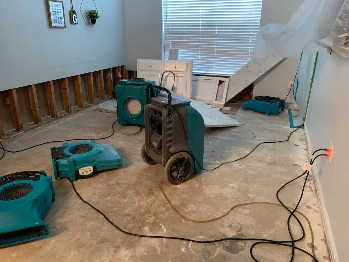 Dehumidifier in flood-cut room for Water Damage Restoration in Ives Estates